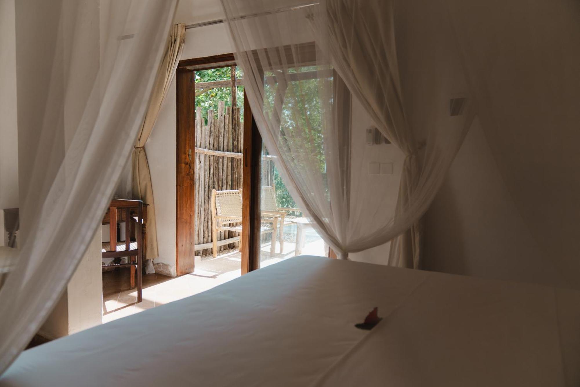 Mvuvi Boutique Resort Kiwengwa  ภายนอก รูปภาพ